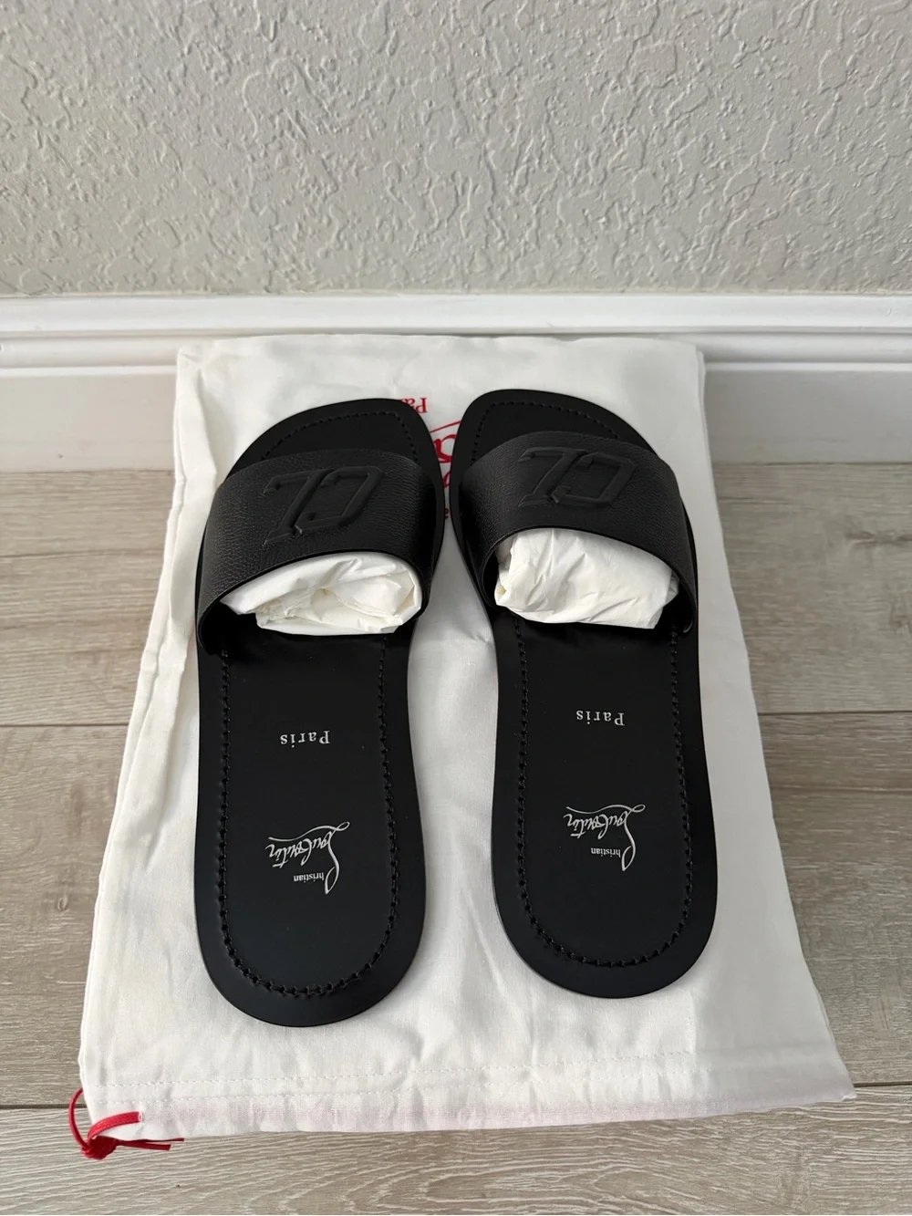 Christian Louboutin Black leather Embossed CL Slide Sandals men 44